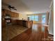 Kitchen with tile flooring, stainless steel appliances, ample cabinets and an adjacent dining area at 4009 Egrets Nest Ct, Mount Holly, NC 28120