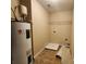 Functional laundry room with essential appliances and ample space for storage and organization at 4009 Egrets Nest Ct, Mount Holly, NC 28120