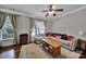 Inviting living room with large windows, neutral tones, and stylish furnishings at 413 Hurston Cir, Charlotte, NC 28208