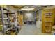 Partially finished basement workshop area with shelving and laundry at 495 Bay Harbour Rd, Mooresville, NC 28117