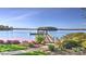 A private dock extends into the serene lake, complete with a gazebo for relaxing waterfront moments at 495 Bay Harbour Rd, Mooresville, NC 28117