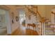 Elegant foyer features hardwood floors, staircase, and decorative niche with display space at 495 Bay Harbour Rd, Mooresville, NC 28117