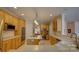 Spacious kitchen with light wood cabinets, tile floor, and a convenient cooktop island at 495 Bay Harbour Rd, Mooresville, NC 28117