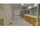 Luxurious main bathroom featuring a jacuzzi tub, a glass shower, and double sinks with vanity at 495 Bay Harbour Rd, Mooresville, NC 28117