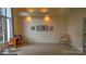 Bright office space with natural light, featuring a classic desk and a serene view of the outdoors at 495 Bay Harbour Rd, Mooresville, NC 28117