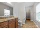 Bathroom with tile floors, vanity, granite countertop, toilet and walk-in shower at 5076 Newport Lakes Dr, Rock Hill, SC 29732