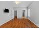 Open bedroom with view of doorways leading to other rooms with light coming in from the window at 5076 Newport Lakes Dr, Rock Hill, SC 29732