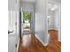 Bright foyer featuring hardwood floors and views to the outside, showcasing the home's entrance at 5076 Newport Lakes Dr, Rock Hill, SC 29732