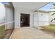 The screened in patio opens to the kitchen, with hardwood floors and modern appliances inside at 5076 Newport Lakes Dr, Rock Hill, SC 29732