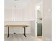 Bedroom featuring an adjustable height desk next to a half bath at 508 Flour Mill Ct, Fort Mill, SC 29715