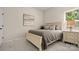 Cozy bedroom with soft carpet, neutral tones, and a comfortable bed, creating a relaxing personal space at 508 Flour Mill Ct, Fort Mill, SC 29715