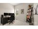 Home office featuring a dark wood desk and bookcase against neutral walls at 508 Flour Mill Ct, Fort Mill, SC 29715