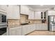 Stylish kitchen boasting granite countertops, stainless steel appliances, and custom cabinetry at 508 Flour Mill Ct, Fort Mill, SC 29715