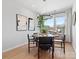 Stylish dining room with modern chandelier, art, and natural light at 5517 Swaling St, Charlotte, NC 28217