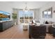 Bright living room with modern furnishings, balcony access, and elegant decor at 5517 Swaling St, Charlotte, NC 28217