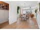 Bright dining room seamlessly connects to the living area with stylish furnishings at 5524 Swaling St, Charlotte, NC 28217