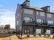 Modern townhome boasts a private balcony and convenient garage access at 5524 Swaling St, Charlotte, NC 28217
