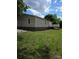 The exterior of the home shows a deck, siding, and brick foundation at 6006 White Store Rd, Marshville, NC 28103