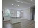 A modern kitchen with stainless steel appliances, granite counters and stylish flooring at 6006 White Store Rd, Marshville, NC 28103