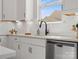 Bright kitchen features a stylish faucet and white subway tile backsplash at 6012 Millbridge Pkwy, Waxhaw, NC 28173