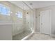 Bright shower with clear glass door and tiled walls, offering a clean and modern feel at 6012 Millbridge Pkwy, Waxhaw, NC 28173