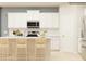 Bright kitchen featuring white cabinets, stainless steel appliances, and a center island at 6274 Fairfax Ct, Maiden, NC 28650