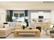 Inviting living room with a comfortable sectional sofa, accent chairs, and bright natural light at 6274 Fairfax Ct, Maiden, NC 28650