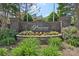 Elegant stone community sign surrounded by lush landscaping, showcasing the prestigious neighborhood entrance at 6315 Prosperity Church Rd, Charlotte, NC 28269