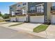 Rear view of townhomes with private balconies above the garages at 6315 Prosperity Church Rd, Charlotte, NC 28269