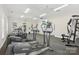 Well-equipped fitness center with modern cardio machines, providing residents with convenient workout options at 6315 Prosperity Church Rd, Charlotte, NC 28269