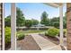 Inviting covered front porch showcasing manicured landscaping and a serene neighborhood view at 6315 Prosperity Church Rd, Charlotte, NC 28269