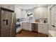 Modern kitchen with stainless steel appliances and ample cabinet space at 6624 Lancer Dr, Charlotte, NC 28226
