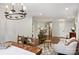 Bright living room with hardwood floors, neutral paint, and comfortable seating arrangement at 6624 Lancer Dr, Charlotte, NC 28226
