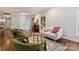 Bright living area with hardwood floors, comfortable seating, and a welcoming ambiance at 6624 Lancer Dr, Charlotte, NC 28226
