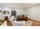 Bright and airy living room with hardwood floors, comfortable seating, and stylish decor at 6624 Lancer Dr, Charlotte, NC 28226