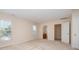 Bedroom featuring neutral carpet, natural light, walk in closet and ensuite bathroom at 6948 Church Wood Ln, Huntersville, NC 28078