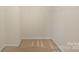 Walk-in closet with neutral carpet and wire shelving at 6948 Church Wood Ln, Huntersville, NC 28078