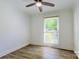 Bright bedroom features new hardwood floors and lots of natural light at 7416 Quail Ridge Dr, Charlotte, NC 28226