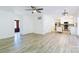 Spacious living room with hardwood floors, leading to the kitchen and front entry at 7416 Quail Ridge Dr, Charlotte, NC 28226