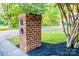 Brick mailbox post with two slots and the house number clearly displayed at 7416 Quail Ridge Dr, Charlotte, NC 28226