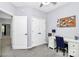 Comfortable bedroom featuring a desk, double closets, and open door view to hallway at 7544 Rolling Meadows Ln, Huntersville, NC 28078