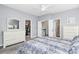 Carpeted bedroom featuring closet access and a connected bathroom at 7544 Rolling Meadows Ln, Huntersville, NC 28078