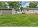 Large backyard with a detached garage and a well-maintained lawn at 772 Austin Rd, New London, NC 28127