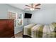 Comfortable bedroom with a dresser and window view offering bright, natural light and inviting space at 772 Austin Rd, New London, NC 28127