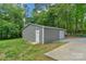 Metal detached garage in a spacious backyard at 772 Austin Rd, New London, NC 28127