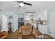 Bright kitchen featuring white cabinets, stainless steel appliances, and an eat-in dining area at 772 Austin Rd, New London, NC 28127