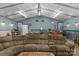 Spacious living room with a sectional couch and a bar, perfect for entertaining guests at 772 Austin Rd, New London, NC 28127