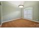 Cozy bedroom with carpet flooring and large windows, offering natural light and a serene ambiance at 8216 Malibu Pointe Ln, Denver, NC 28037