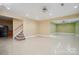 Spacious rec room with staircase, recessed lights, ceiling fan, and neutral walls at 8216 Malibu Pointe Ln, Denver, NC 28037