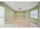 Spacious living room with neutral walls, ceiling fan, recessed lighting and window views at 8216 Malibu Pointe Ln, Denver, NC 28037